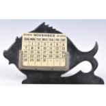 ART DECO BAKELITE DESKTOP CALENDAR IN THE FORM OF A FISH