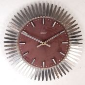 ACCTIM LATER 20TH CENTURY STAINLESS STEEL STARBURST CLOCK