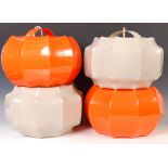 SET OF FOUR 1970'S ORANGE AND WHITE PLASTIC CEILING LAMP SHADES