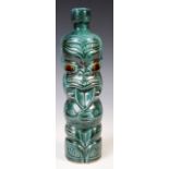 UNUSUAL MID-CENTURY NEW ZEALAND TIKI BOTTLE / LIQUOR BOTTLE