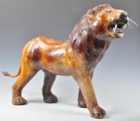 EARLY TO MID 20TH CENTURY PAPIER MACHE LION WITH GLASS EYES