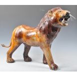 EARLY TO MID 20TH CENTURY PAPIER MACHE LION WITH GLASS EYES