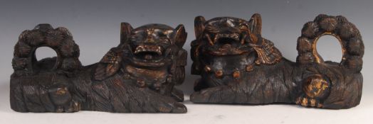 PAIR OF ANTIQUE CHINESE TEMPLE LIONS CARVED FROM PAULOWNIA WOOD