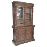 19TH CENTURY LARGE GOTHIC OAK CARVED LIBRARY BOOKCASE