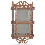 19TH CENTURY MAHOGANY FRETWORK MIRRORED SET OF SHELVES