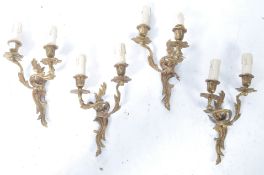 SET OF FOUR ROCOCO INFLUENCE ORMOLU WALL SCONCES