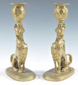 PAIR OF 19TH CENTURY BRASS STYLIZED CATS CANDLESTICKS