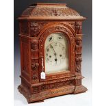 EARLY 20TH CENTURY GERMAN OAK JUNGHANS BLACK FOREST CLOCK