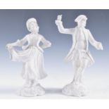 A PAIR OF 18TH CENTURY BISCUIT PORCELAIN FIGURES