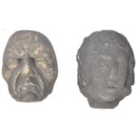 A PAIR OF EARLY CARVED STONE MEDIEVAL CARVED HEADS - CAUBLES