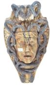 LARGE CARVED STONE MEDUSA HEAD MASK WITH LEAD SNAKES TO HAIR