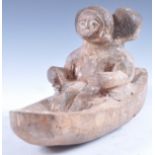UNUSUAL 19TH / 20TH CENTURY NORTHERN AFRICAN TRIBAL FIGURE IN BOAT