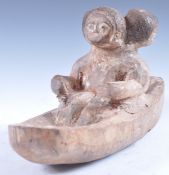 UNUSUAL 19TH / 20TH CENTURY NORTHERN AFRICAN TRIBAL FIGURE IN BOAT