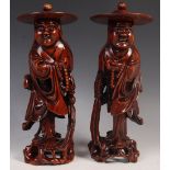 PAIR OF 19TH CENTURY CARVED MONK FIGURES WITH BONE TEETH AND GLASS EYES