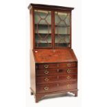 A GEORGE III 18TH CENTURY MAHOGANY INLAID BUREAU BOOKCASE