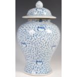 19TH CENTURY CHINESE BLUE AND WHITE TEMPLE JAR OF WAISTED FORM