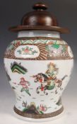 19TH CENTURY CHINESE LARGE FAMILLE VERTE TEMPLE JAR AND COVER