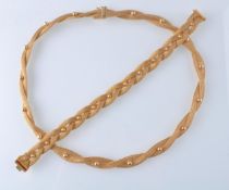 A MID CENTURY ITALIAN 18CT GOLD TOSATO BRUNO NECKLACE AND BRACELET SUITE
