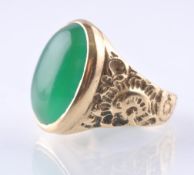 A HALLMRKED 9CT GOLD CABOCHON RING