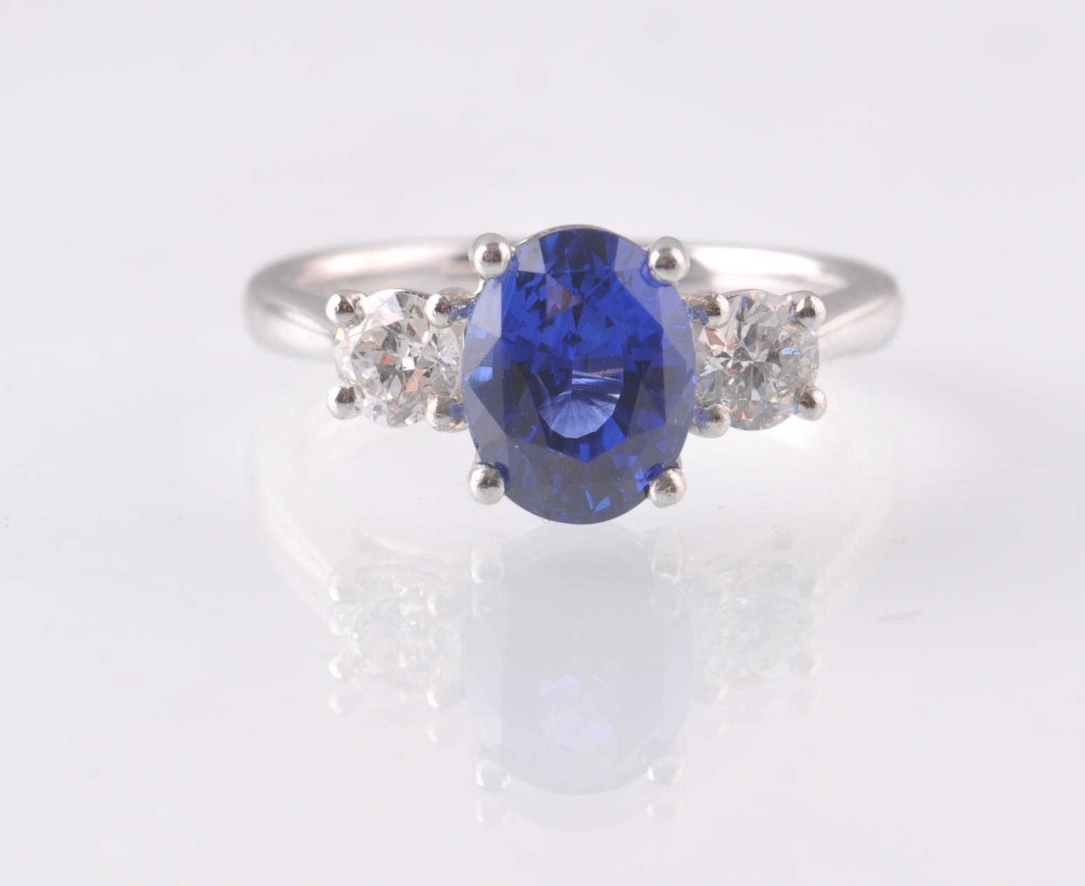 A PLATINUM SAPPHIRE & DIAMOND THREE STONE RING. - Image 5 of 5