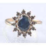 9CT GOLD SAPPHIRE AND DIAMOND CLUSTER RING APPROX 20PNTS
