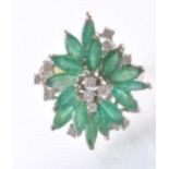 AN 14CT GOLD EMERALD AND DIAMOND CLUSTER DRESS RING.