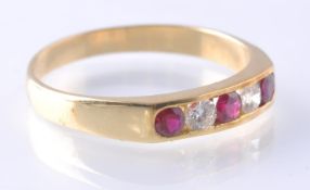 A HALLMARKED 18CT GOLD RUBY AND DIAMOND 5 STONE RING
