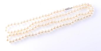 A 18CT GOLD DIAMOND & PEARL NECKLACE