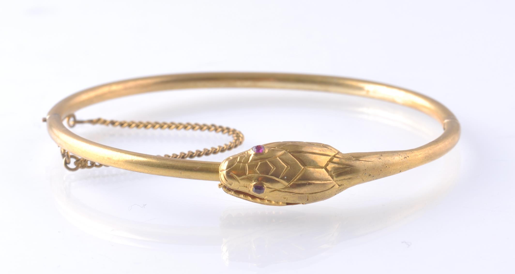 AN ANTIQUE OUROBOROS GOLD AND RUBY SNAKE BANGLE - Image 2 of 4