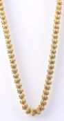 A HALLMARKED 9CT GOLD FANCY LINK NECKLACE
