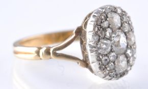 A LATE 19TH CENTURY 18CT GOLD, SILVER AND DIAMOND CLUSTER RING.