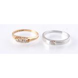 TWO 18CT GOLD AND DIAMOND RINGS TO INCLUDE SOLITAIRE & 3 STONE