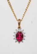 9CT YELLOW GOLD DIAMOND AND RUBY PENDANT AND NECKLACE