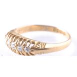 AN HALLMARKED 18CT GOLD AND DIAMOND 5 STONE RING