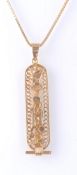 AN 18CT GOLD EGYPTIAN PENDANT NECKLACE AND CHAIN