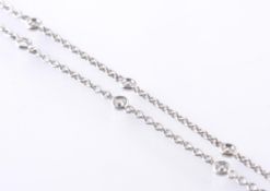 AN 18CT WHITE GOLD AND DIAMOND NECKLACE - 16 COLLET SET DIAMONDS