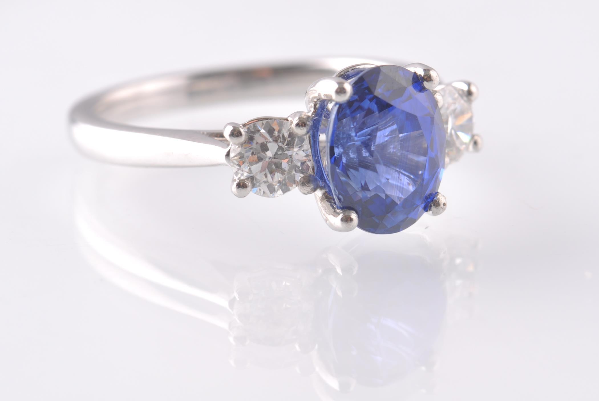 A PLATINUM SAPPHIRE & DIAMOND THREE STONE RING. - Image 3 of 5