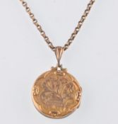 9CT GOLD F&B LOCKET AND ROLLED GOLD BOOK CHAIN