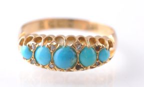 An 18CT GOLD & TURQUOISE GYPSY RING - 1915