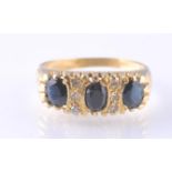 18CT GOLD SAPPHIRE AND DIAMOND RING