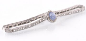 A EARLY 20TH CENTURY CARVED SAPPHIRE & DIAMOND BRACELET