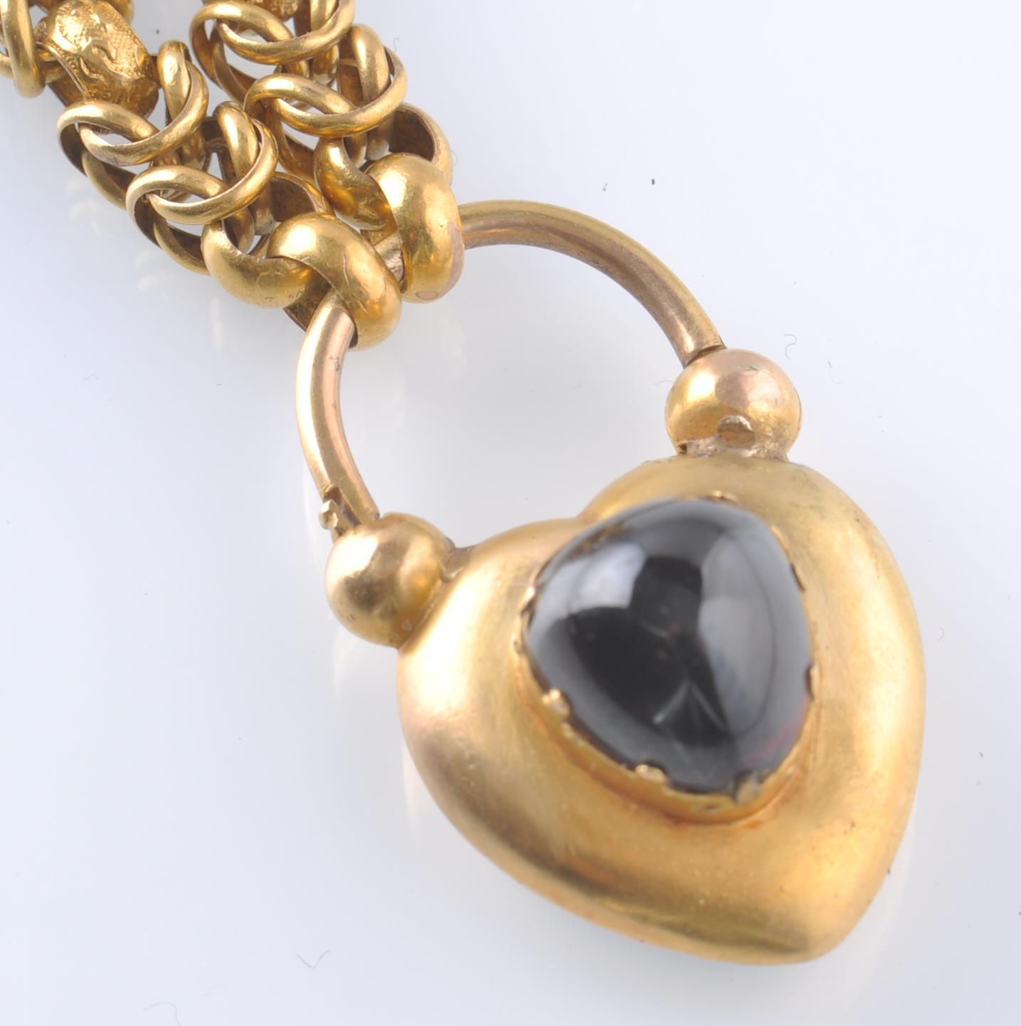 A VICTORIAN GOLD GARNET LOCKET & FANCY LINK CHAIN BRACELET