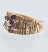 HALLMARKED 9CT GOLD GARNET STONE AND WHITE CLUSTER RING