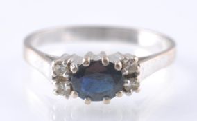 A HALLMARKED 18CT GOLD SAPPHIRE & DIAMOND RING