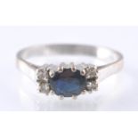 A HALLMARKED 18CT GOLD SAPPHIRE & DIAMOND RING