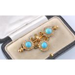 AN ANTIQUE CASED 18CT GOLD TURQUOISE DIAMOND TREFOIL BROOCH PIN
