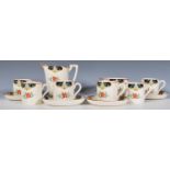 An early 20th Century circa 1920's Minton's Art Deco part coffee service, the service consisting