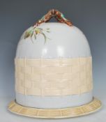 A large 19th Century Victorian Continental majolica cheese dish and cover in the manner of George