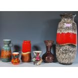 A collection of West German and vintage studio art pottery to include a large mottled lava vase, a