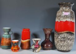 A collection of West German and vintage studio art pottery to include a large mottled lava vase, a
